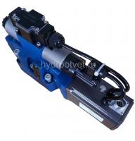 4WRTE10V50L-4X/6EG24ETK31/A1M - Пропорциональный быстродействующий распределитель с обратной связью по положению золотника и со встроенным усилителем (OBE), Ду10, A1 = ±10 В, номинальный расход 50 л/мин, схема V, каналы управления ET = X и Y - внутренние